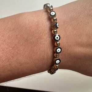Goldtone and Black Evil Eye Beaded Bracelet Elastic band
